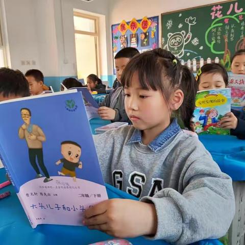 鄠邑区光明小学“阅读悦享  共沐书香”读书活动倡议