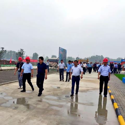 寿县33个移民迁建项目业主到华东公司双桥镇靠城安置点项目现场观摩