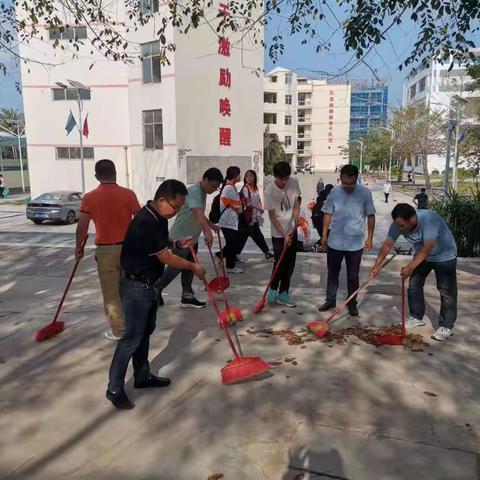 陵水民族中学党支部开展“美化校园环境”主题党日活动