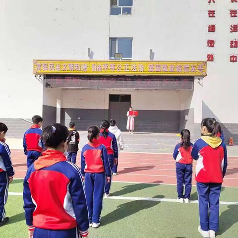 开鲁县工农小学“世界结核病防治日”主题升旗仪式