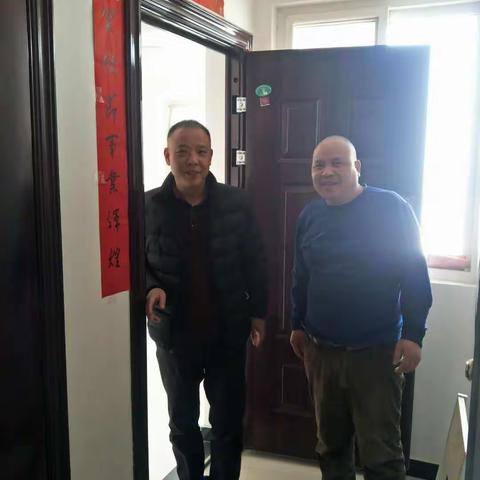 脱贫攻坚 我们在行动   春节来临街办齐祝福