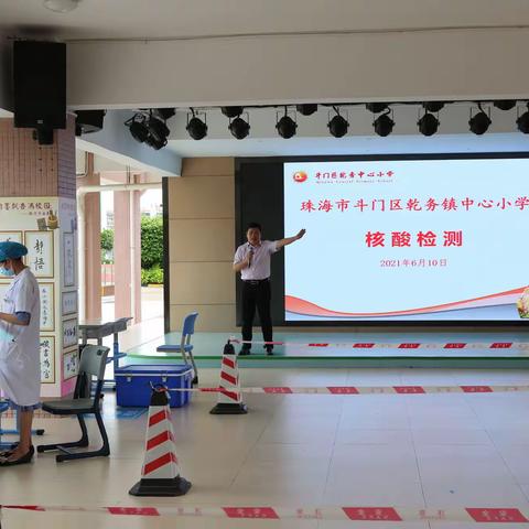 全民检测，从我做起！——乾务镇中心小学核酸采样现场