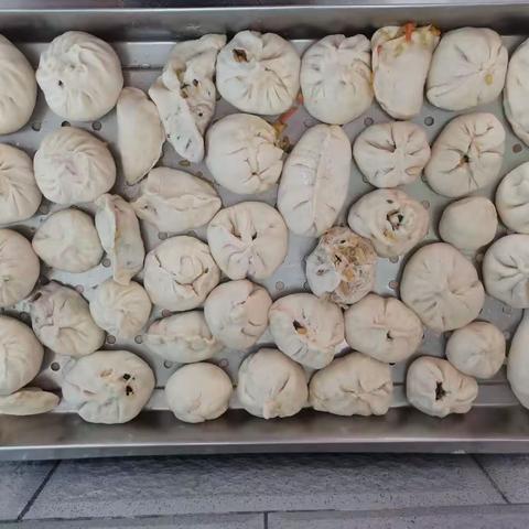 芮城县寿圣幼儿园中五班四月份生活体验—美味的包子