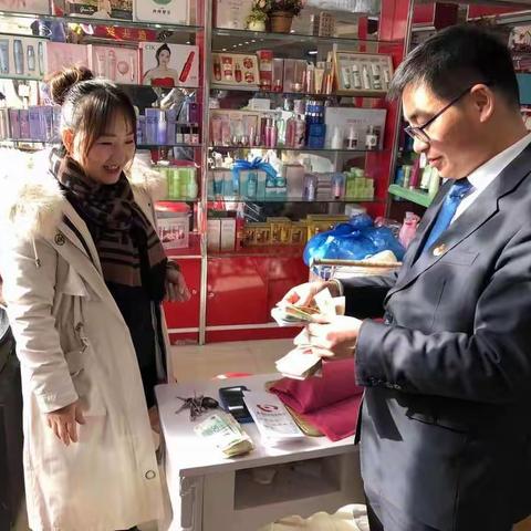 文殊信用社开展“入商户换零钞”活动