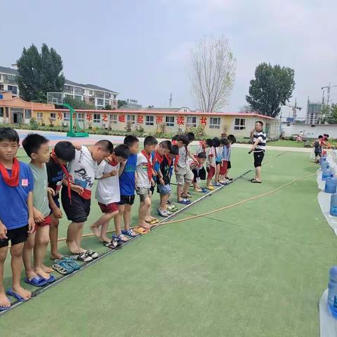 泼洒快乐，健康成长——乐学求实小学二一班泼水节活动