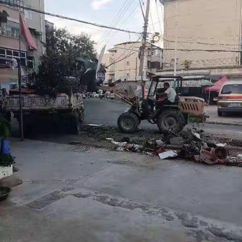 清理卫生死角，美化社区环境，积极创建文明城市，争创共享共建星