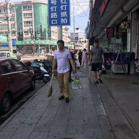 喜迎建党98周年 人大机关志愿者在行动