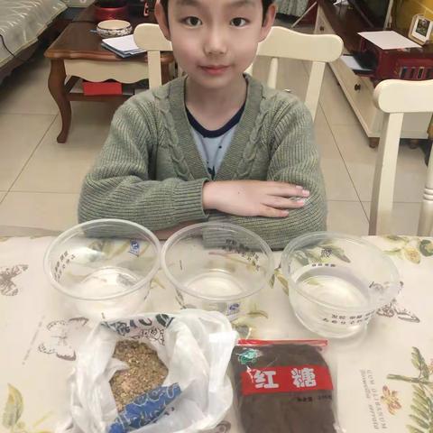 九一小学三年级科学实验：沙子和红糖混合后如何分离