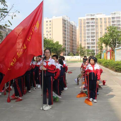 "芬芳三月，花儿最美"一一一记钦州市第十一小学"雷锋月"主题系列活动