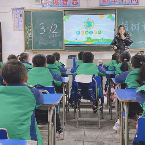 多一片绿叶，多一份温馨——记九小二三中队植树节活动