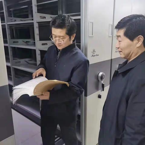 王浩到县档案馆实地调研