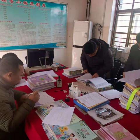 落实“双减”政策 优化作业管理——伏道镇岗阳学区教案作业检查活动