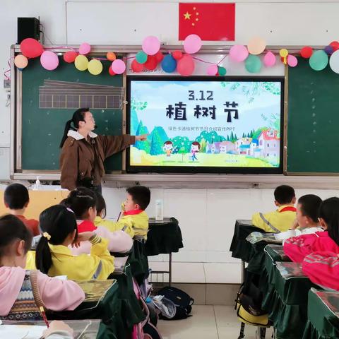 植树护苗添新绿 绿动校园齐创造