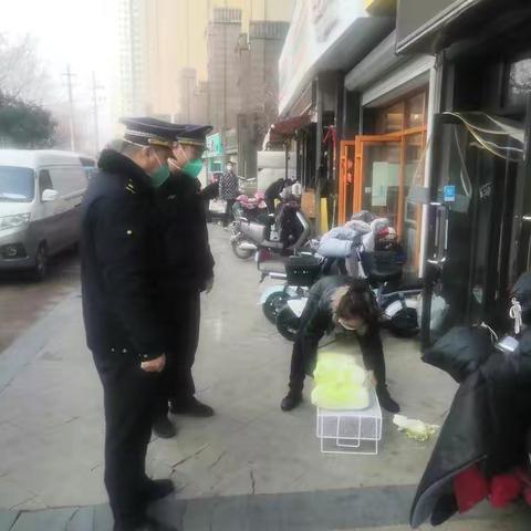 道德街城管委严格“门前五包”责任制落实