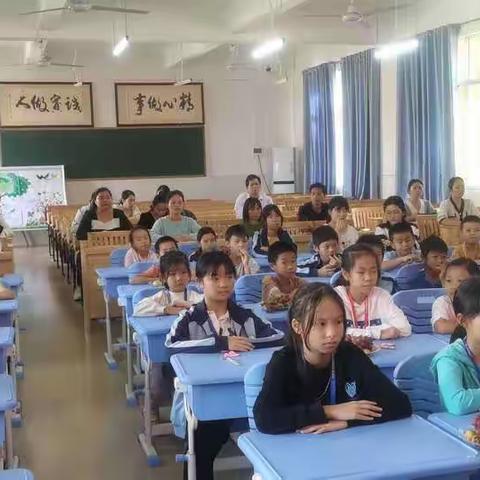 驮卢镇中心小学“红心向党 携爱同行”关爱留守儿童活动