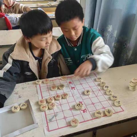 以棋促智，以棋育人