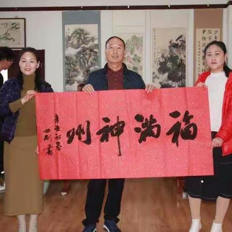 神州集团、大城县西留各庄诗词书画社写、送春联活动