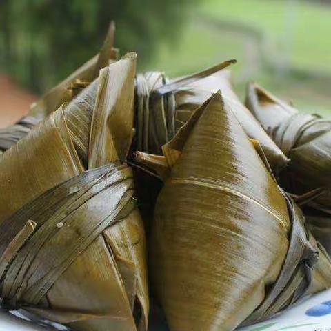 弘扬传统文化 寄情端午佳节——石堡学校端午节包粽子实践活动