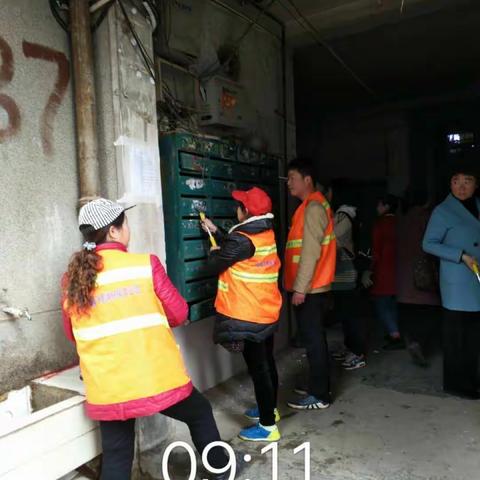 馨飞雪公司在夹河社区开展“迎军运，清洁家园”活动