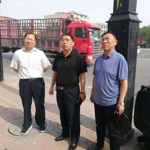 不惧高温天气     持续深入推进“三化”建设户外广告专项整治工作