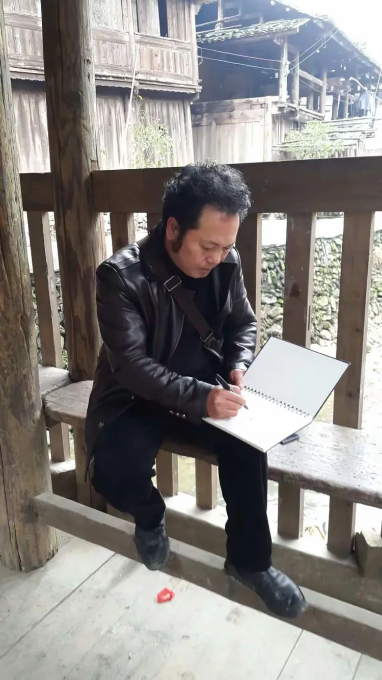 画家李玉福先生在速写画家候熙先生在作画画家毛雨先生在作画画家何