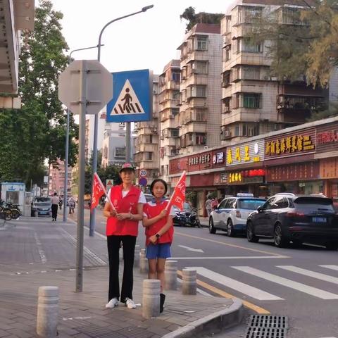 湖景社区开展创建文明交通劝导志愿服务活动