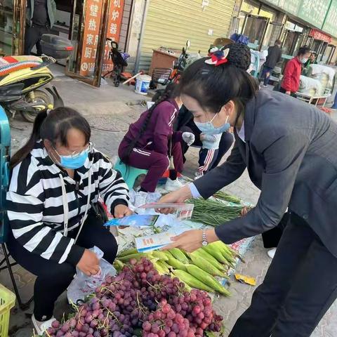 宁夏银行永宁支行走进县城“早集”开展金融知识及919惠民生活节相关活动的宣传