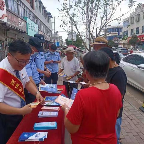 颍淮农商行九龙支行“我为群众办实事”之反假币宣传