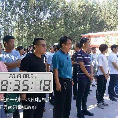 司法局局长张仲林带队到南阳堡镇参加走贫日活动