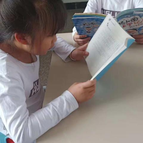 世界读书日，4月23日...白龙桥第二小学，我们是二《1》班罗光云和罗光云