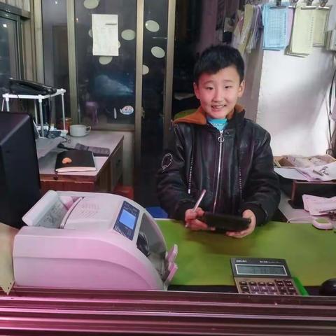 金华市环城小学四(3)班申曙正，温暖中国年360度社会微体验—小小收银员