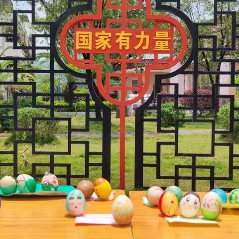 石榴花开成长路 一起向未来    ——新圩中心小学开展“中国心 端午情”铸牢中华民族共同体意识主题系列实践活动