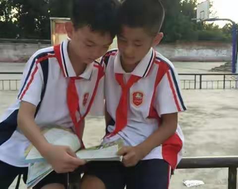 “小手拉大手，文明一起走”九里山小学五二班暑期实践活动