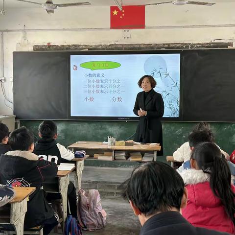 关注课堂检测 落实目标达成——李口镇中心学校举行五年级数学教研活动