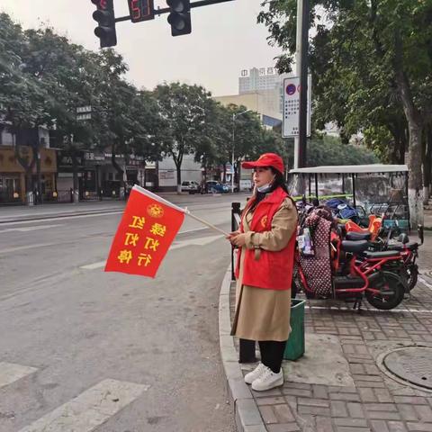 宜阳县投资促进中心开展文明助交通志愿服务活动