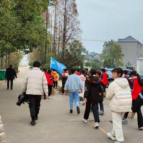 小手拉大手，美在我心中——记怀志小学