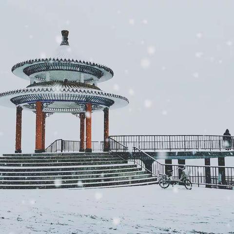 江畔听雪