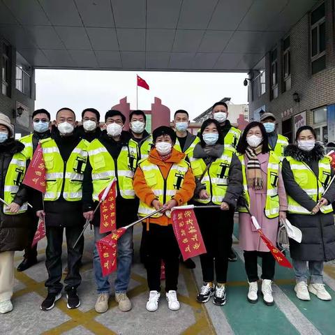 春寒料峭护学忙——记泰安师范附属学校三年级六班2023年度安全文明出行执勤日