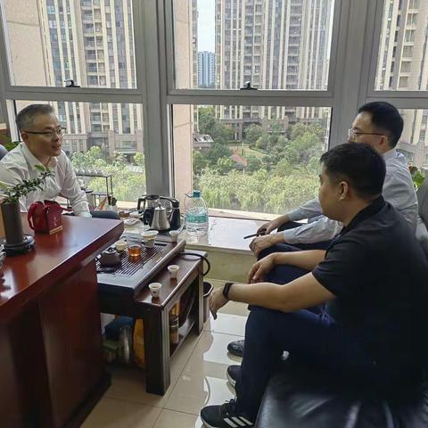 区工信局拜访市工信局