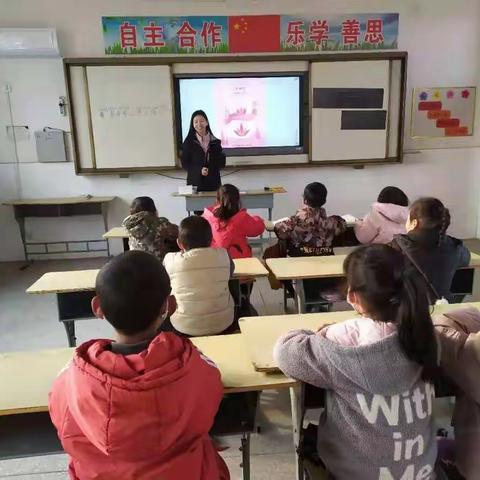 串村小学庆三.八主题班会活动