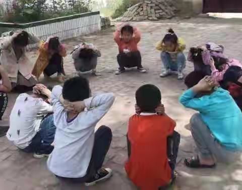 冯庄乡张奇庄小学开展防震减灾安全演练活动