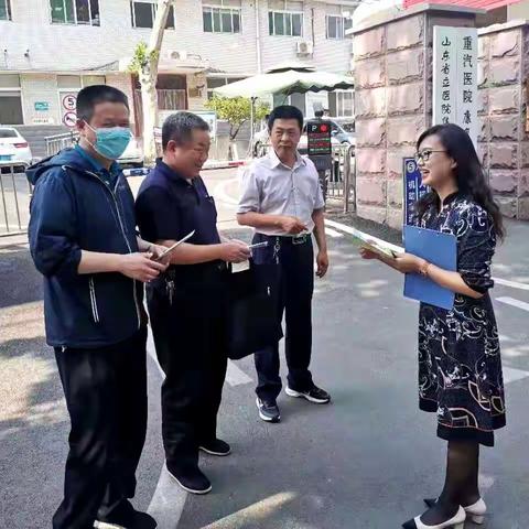 天桥区人大机关党支部到无影潭社区开展“双报到”志愿服务活动