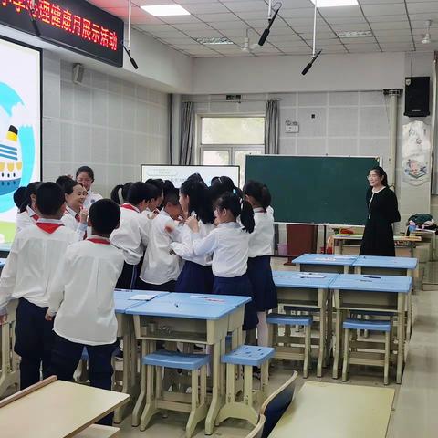 守护心灵  将爱传承——记开发区金城小学心理健康月展示活动