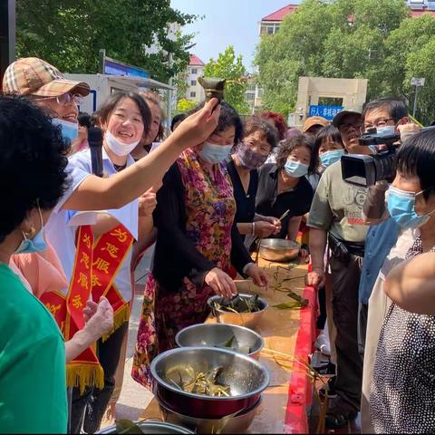 金舍德圆社区“粽叶飘香迎端午，幸福和谐邻里情”端午节包粽子比赛活动