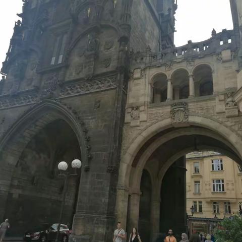 Charles Bridge is a historic bridge that crosses the Vltava 