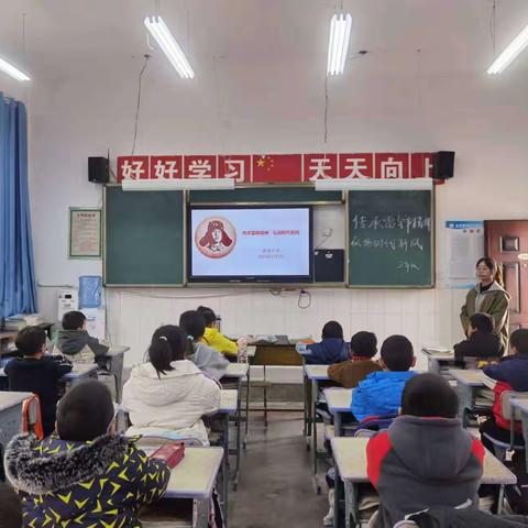 梓潼县金龙小学“继承雷锋精神，弘扬时代新风”主题班会活动