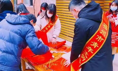 吴航街道洋锦社区开展“挥毫泼墨送春联  翰墨飘香”活动