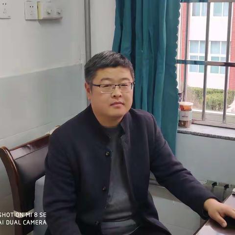 严爱相济 教书育人
