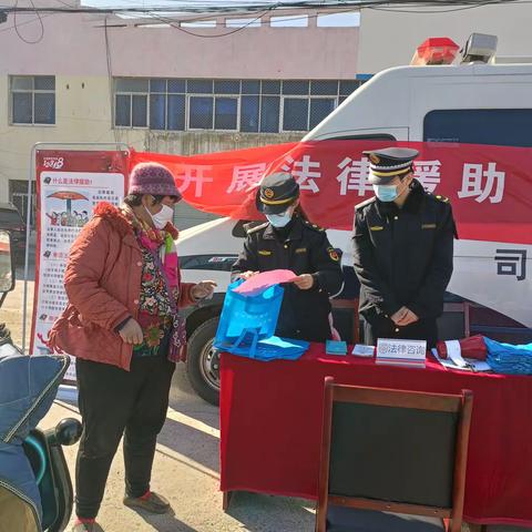 新市中队开展城市管理普法宣传暨城市管理进社区活动