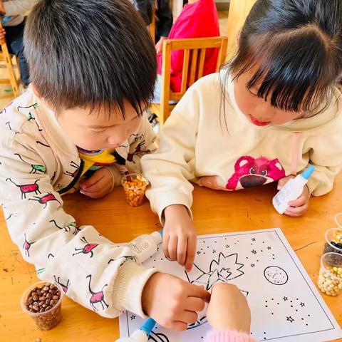 神奇种子在这里---海青中心幼儿园大一班种子粘贴画